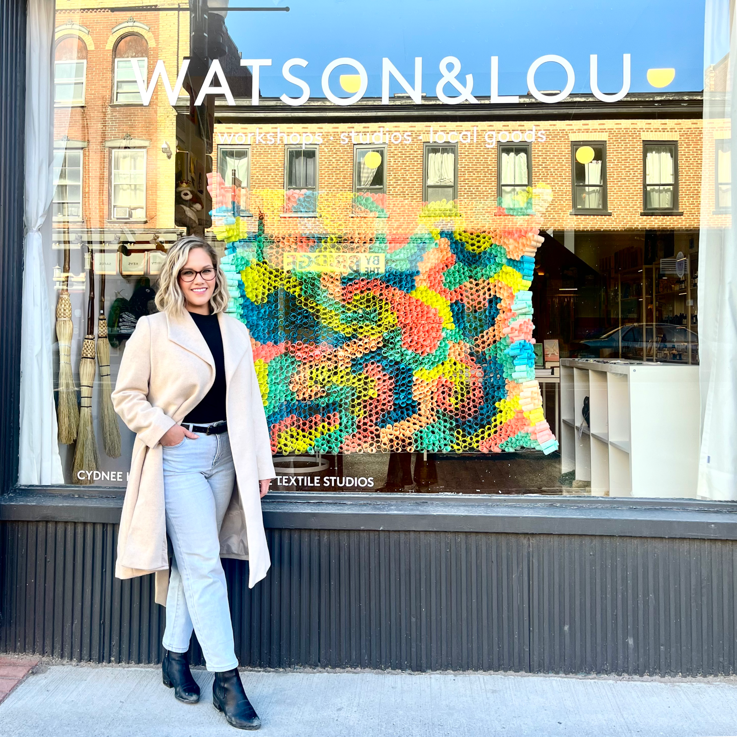 Erin-Ebenbauer-in-Front-of-Watson-&-Lou-(square)
